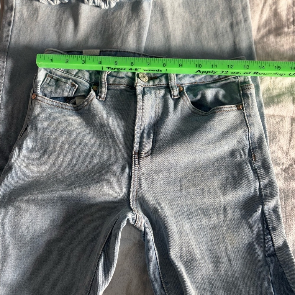 Almost Famous Flare Leg Jeans Size 3 
Multi colored denim. Frayed bottoms. - Picture 3 of 7